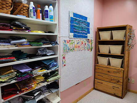 Picture of Thread and Timber's design board and fabric storage area